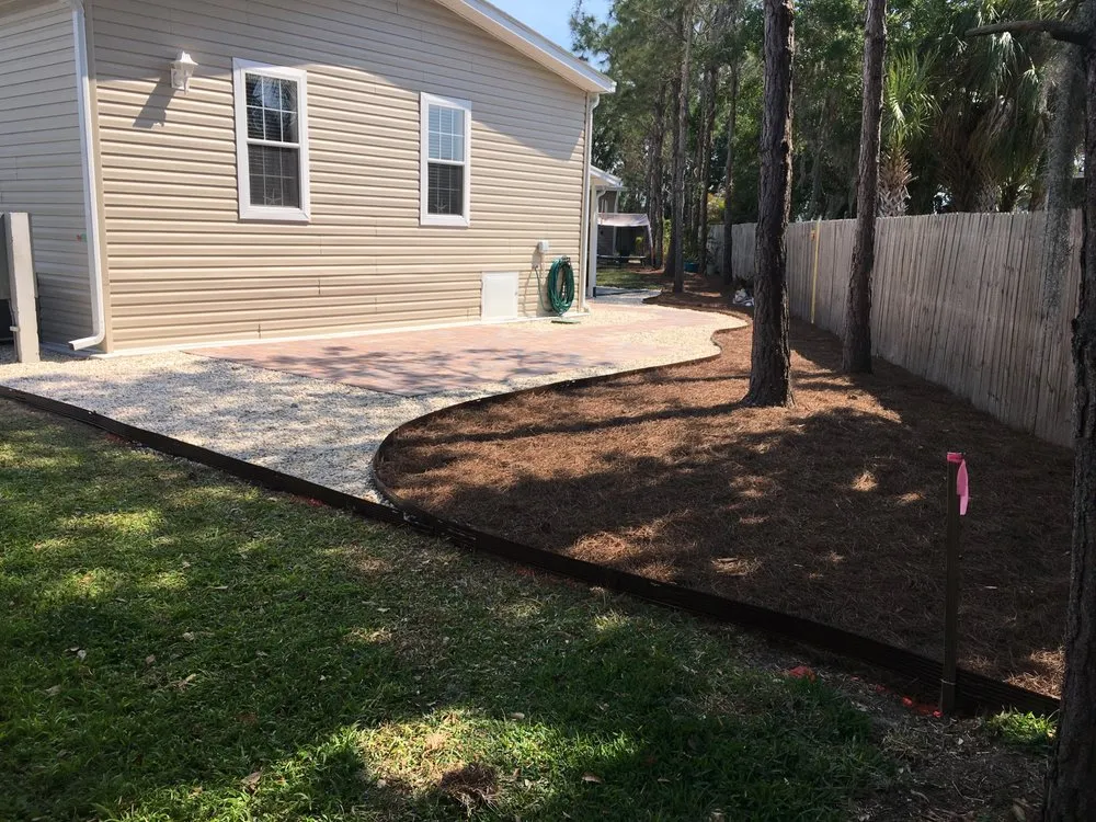 Expert landscaping services for beautiful yards across Punta Gorda, FL - Palm Trees Plus