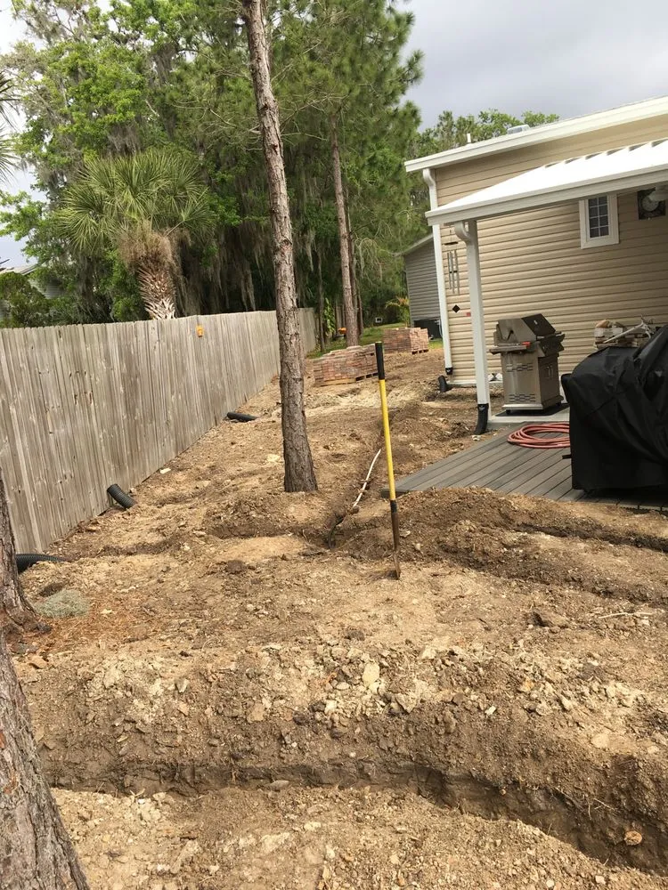 Custom lawn mowing service for residential properties across Punta Gorda, FL - Palm Trees Plus