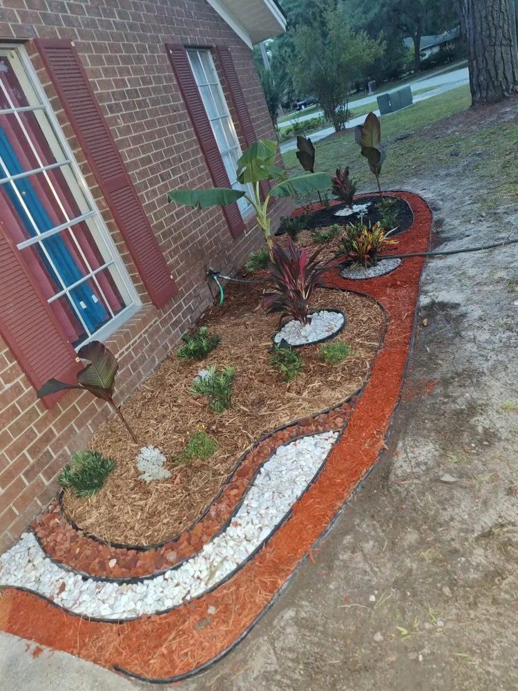 Top-rated garden landscaping for year-round maintenance in Savannah, GA by Palmer's Loving Lawn's & light landscaping