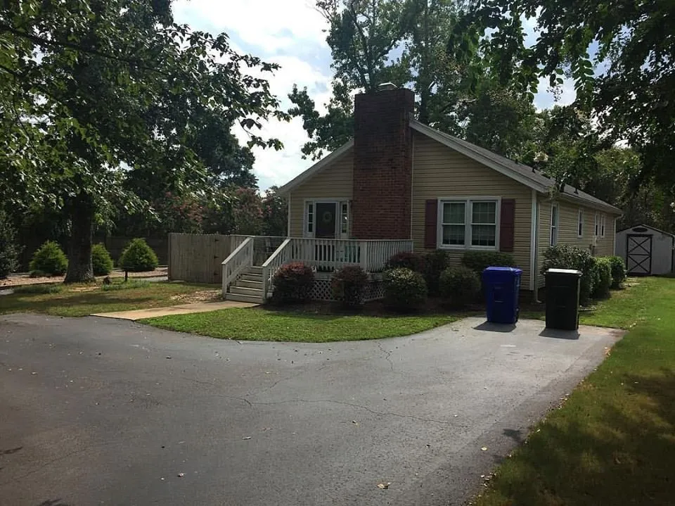 Top-rated outdoor landscaping with custom design in Taylors, SC by Palmetto Lawn and Pest