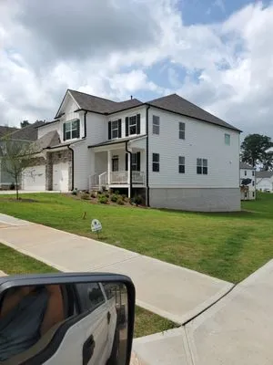 Palmour's Lawn Care Logo