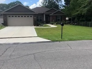 Professional yard maintenance in Panama City Beach, FL by Panhandle Lawn Care & Pressure Washing