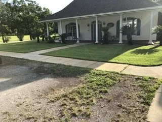 Expert lawn mowing service with custom design in Panama City Beach, FL by Panhandle Lawn Care & Pressure Washing