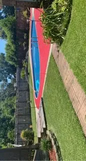 Affordable lawn mowing service for homes across Panama City Beach, FL - Panhandle Lawn Care & Pressure Washing