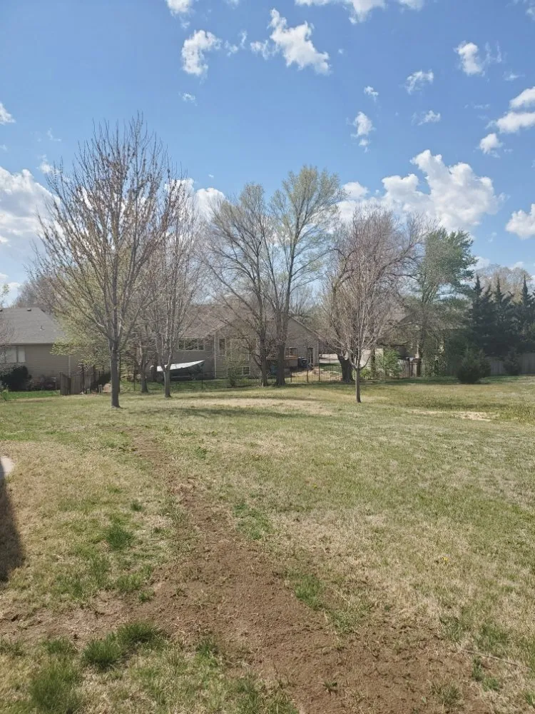 Affordable yard maintenance for homes in Derby, KS by Papabon's Lawn and Home Service