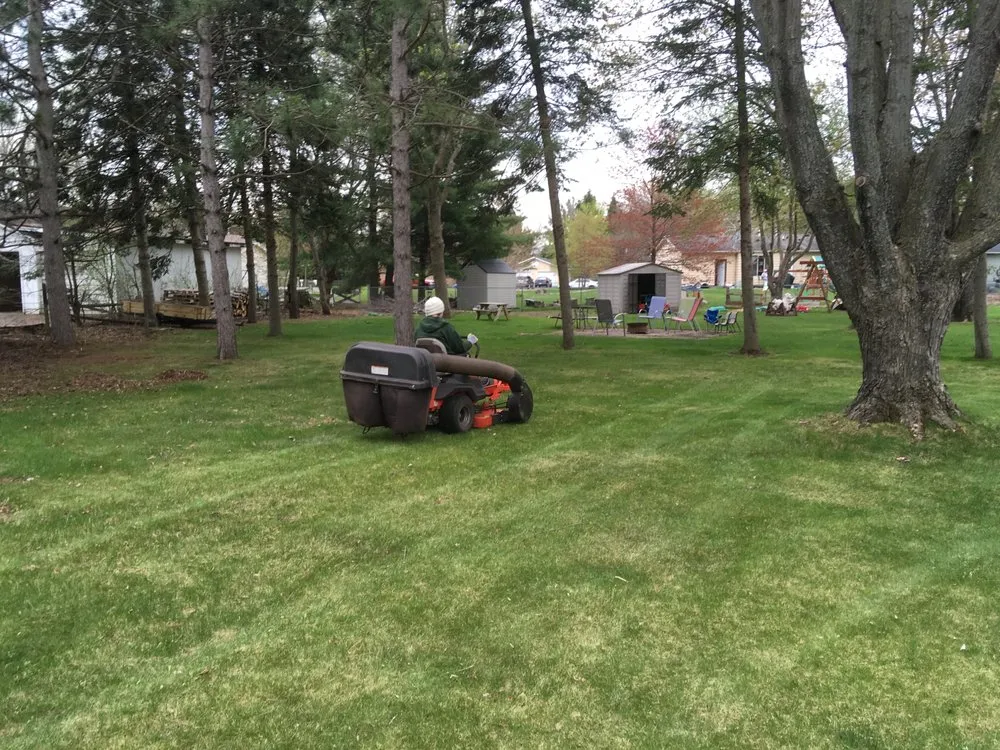 Affordable yard maintenance for homes across Eau Claire, WI - Paradise Lawn & Landscape