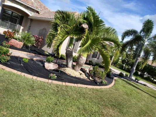 Paradise Lawn & Landscape Logo