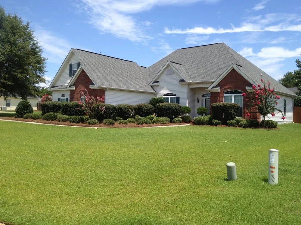 Affordable landscape design with custom design in Bonaire, GA by Paradise Lawn Care Services
