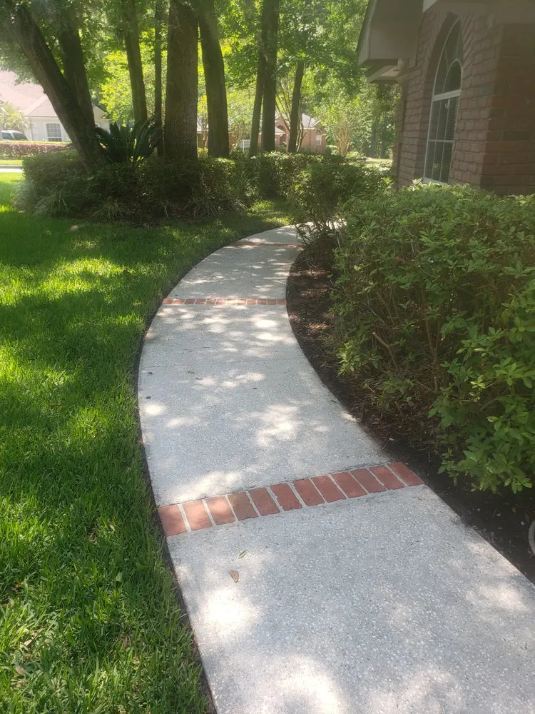 Expert lawn mowing service with custom design across Orange Park, FL - Paradise Lawn