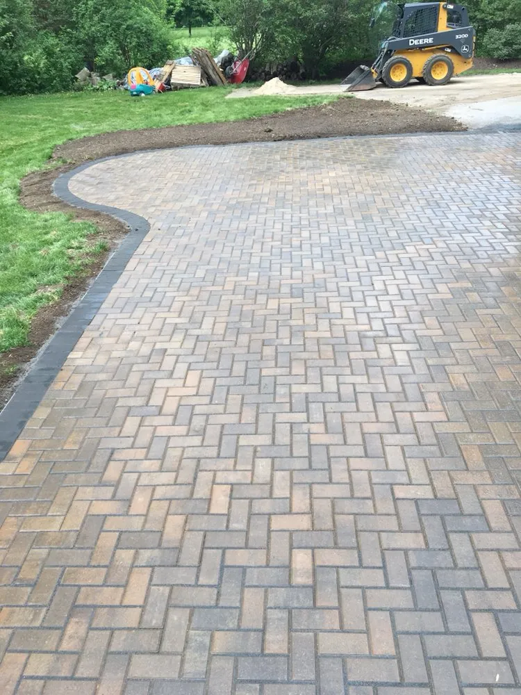 Top-rated yard cleanup service for homes in West Bend, WI by Paradise Lawnscapes