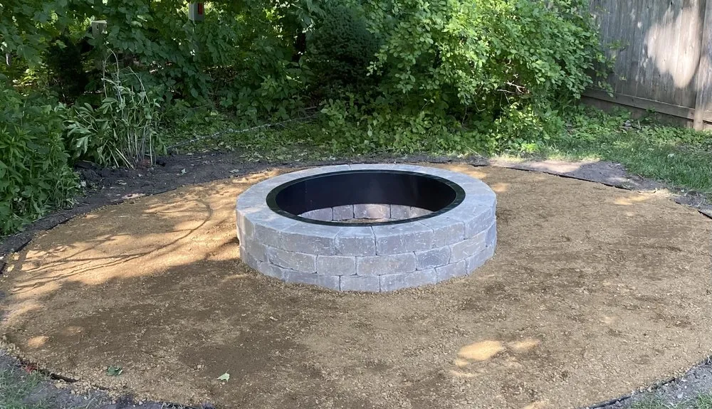 Affordable landscape installation with custom design in West Bend, WI by Paradise Lawnscapes