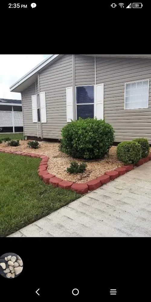 Professional landscape design for year-round maintenance in Ormond Beach, FL by Paradise Tree and Landscaping