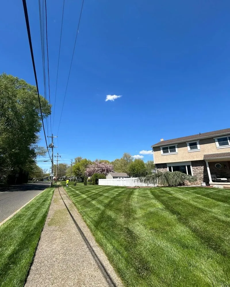Affordable lawn mowing service for residential properties in Fallsington, PA by Paragano Landscaping