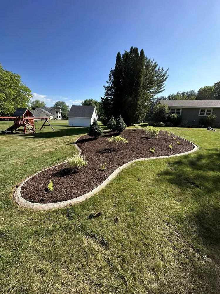 Professional lawn mowing service for year-round maintenance in Plymouth, WI by Parm's Landscape Management