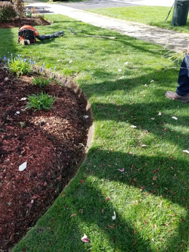 Professional lawn care service for homes in Aurora, IL by Partner's Landscaping