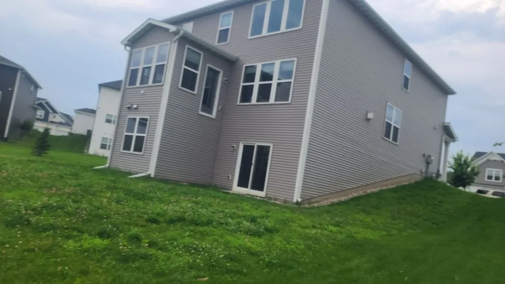 Custom landscape design for year-round maintenance in Saint Paul, MN by Pascal Lawn Care Services