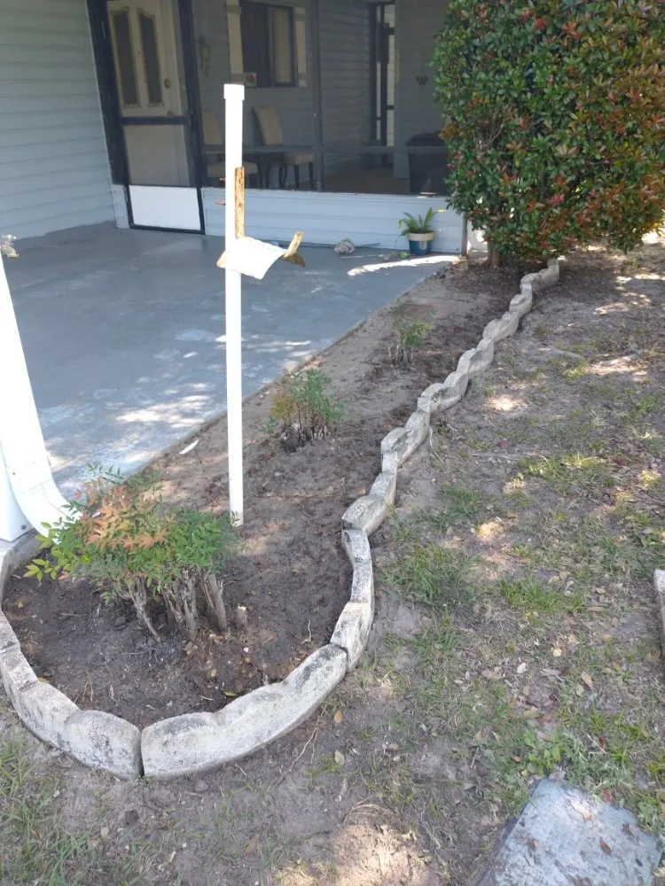 Professional landscape installation with custom design across Belleview, FL - Pat and Kim's House Cleaning, Landscaping and Tree Work