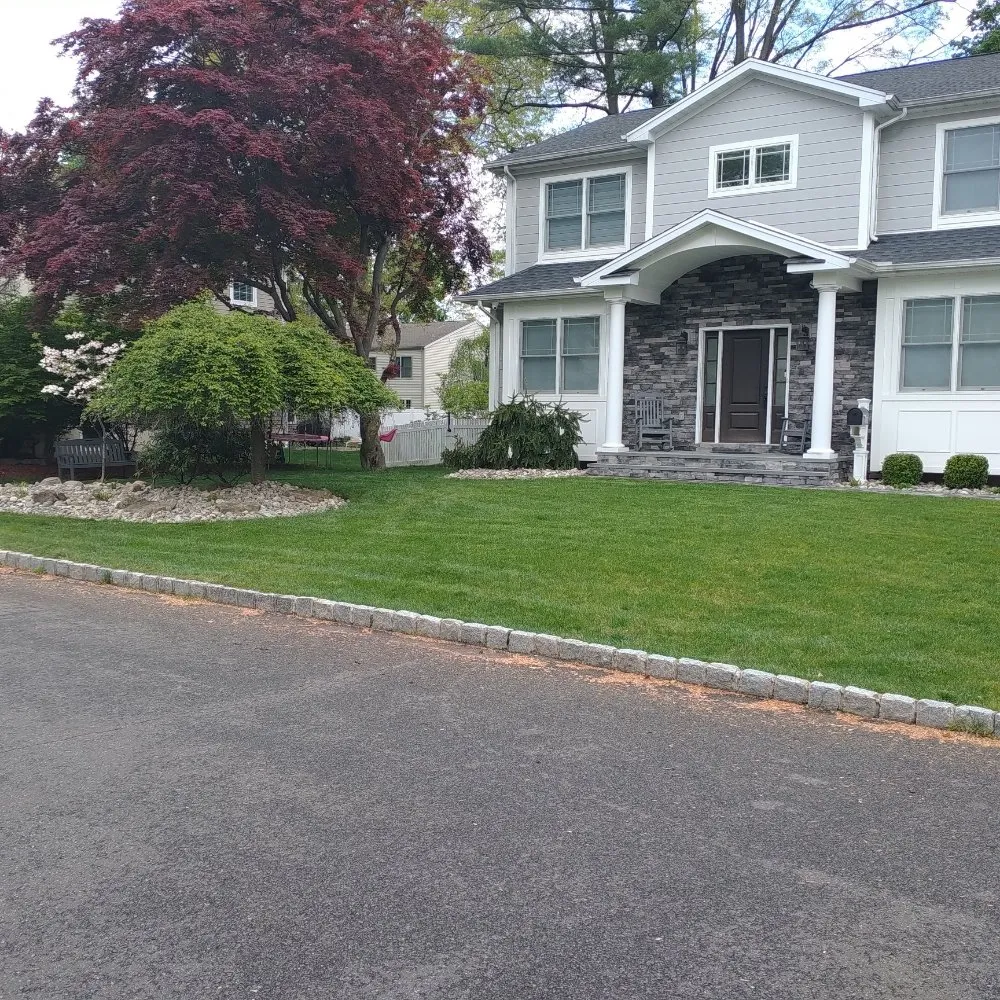 Local lawn mowing service for year-round maintenance in Garfield, NJ by Pat Landscaping Services