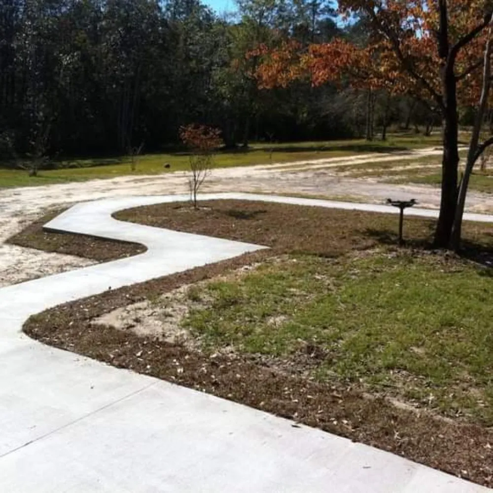 Trusted lawn care service in SEMMES, AL by Pate Construction Services