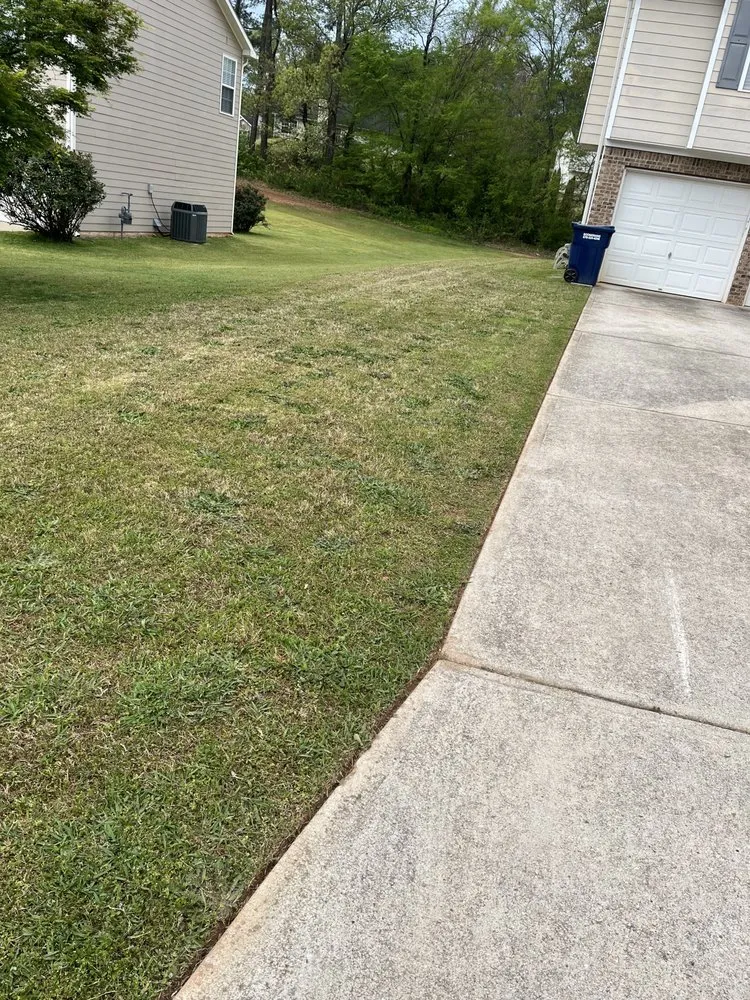 Expert yard maintenance for beautiful yards in Douglasville, GA by Patino Landscaping