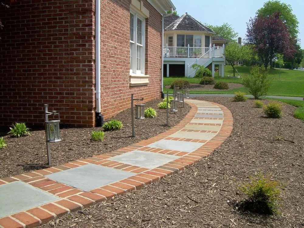 Professional lawn mowing service for homes across Woodbridge, VA - Patios and Gardens Design & Build