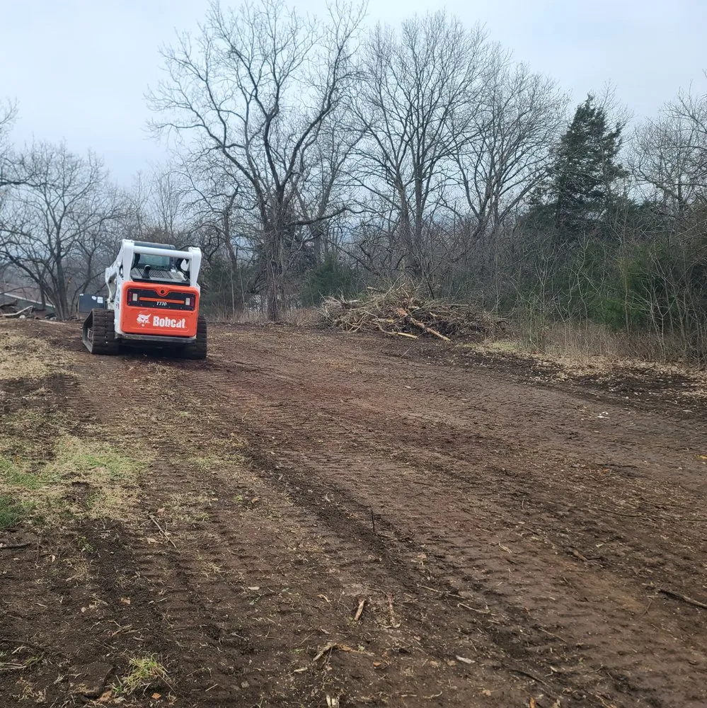 Professional lawn mowing service experts serving Sedalia, MO - Patriot Dirtworx