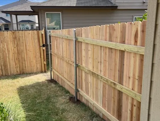 Patriot Fencing, Lawn & Landscaping Logo