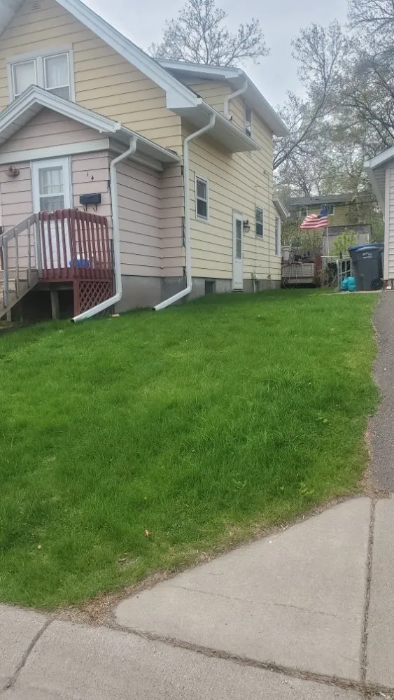 Expert landscape installation with custom design in Superior, WI by Patriot Lawn Care.