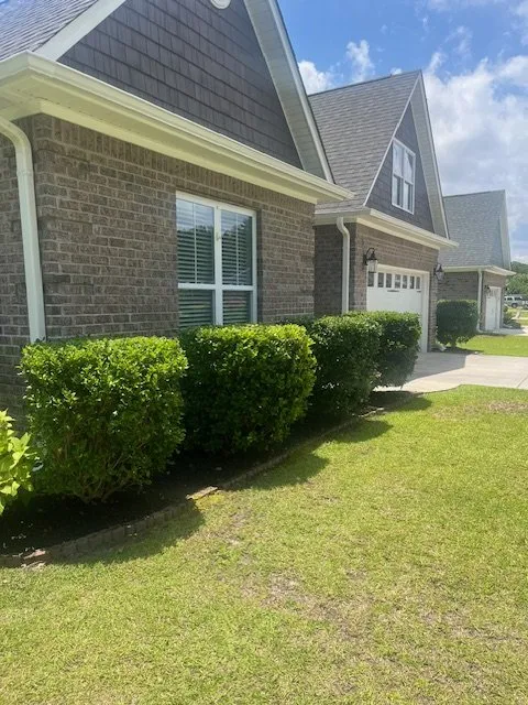 Custom landscape installation in Ocean Isle Beach, NC - Patriot Lawn