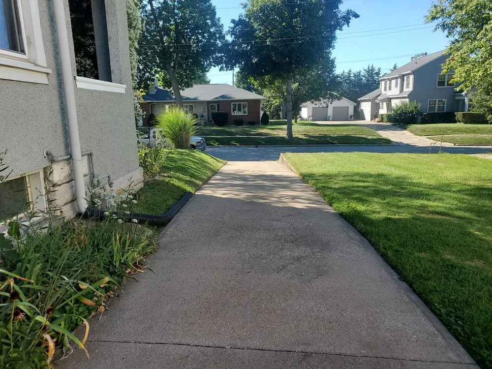 Local landscape installation for homes in Quincy, IL by Patriot Lawn Services