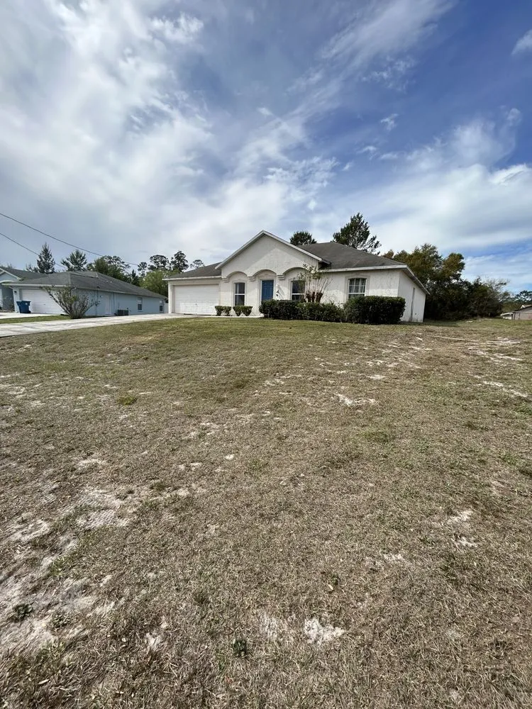 Top-rated landscape design with custom design in Spring Hill, FL by Patriot Services