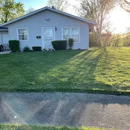 Custom lawn care service for residential properties in New Lenox, IL by PatwsLawnCare Of New Lenox