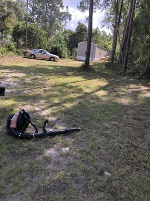 Pauland Lisa Lawn Care Logo