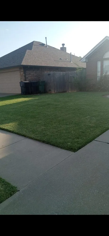 Affordable yard cleanup service with custom design in Moore, OK by Paul's Lawn and Tree Service