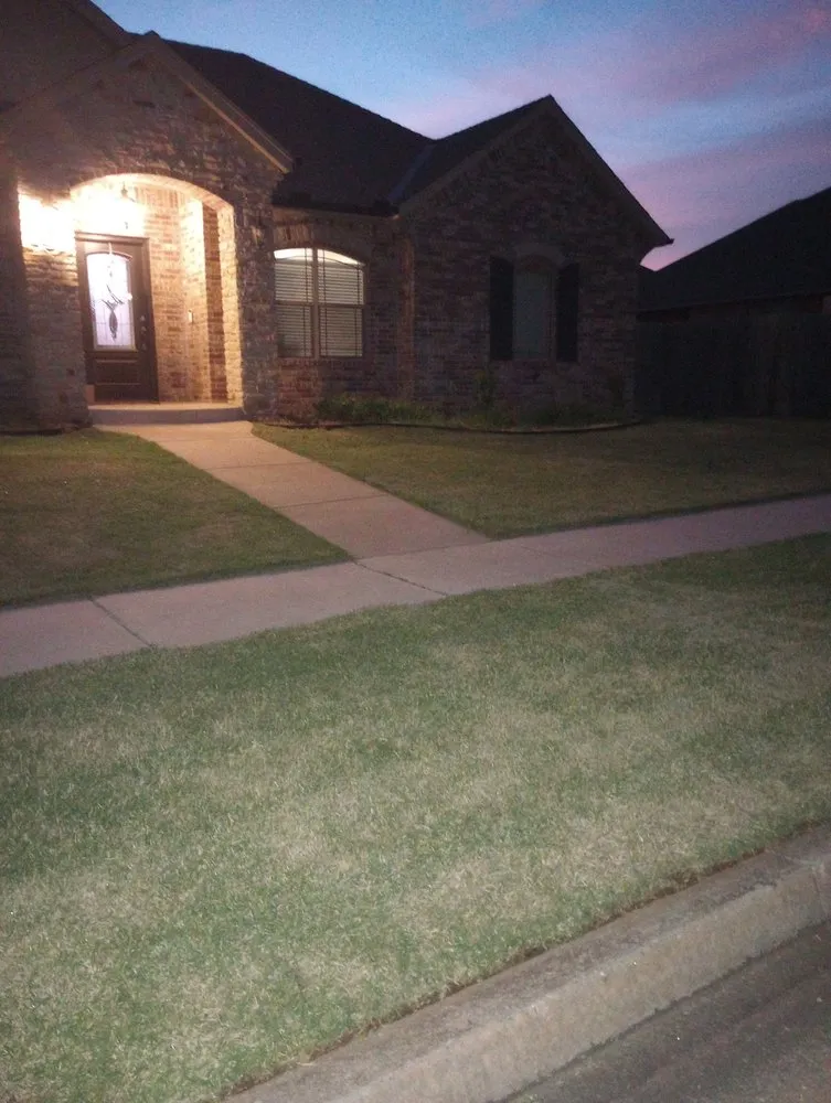 Top-rated landscape installation with custom design in Moore, OK by Paul's Lawn and Tree Service
