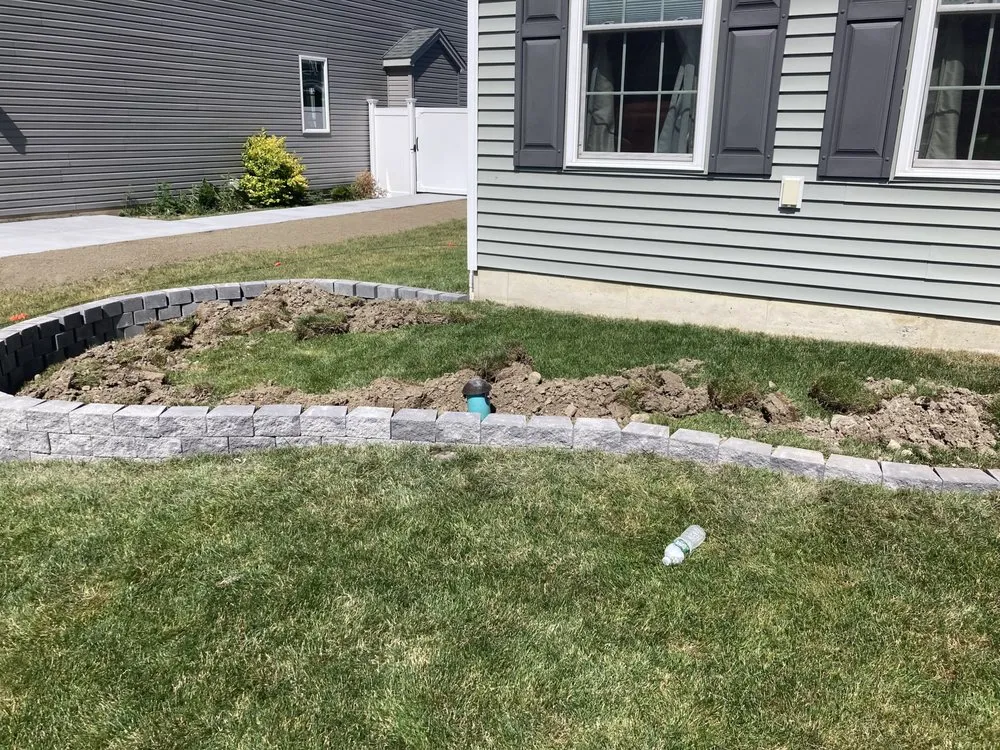 Local lawn care service with custom design in West Seneca, NY by Paul's Lawn Care