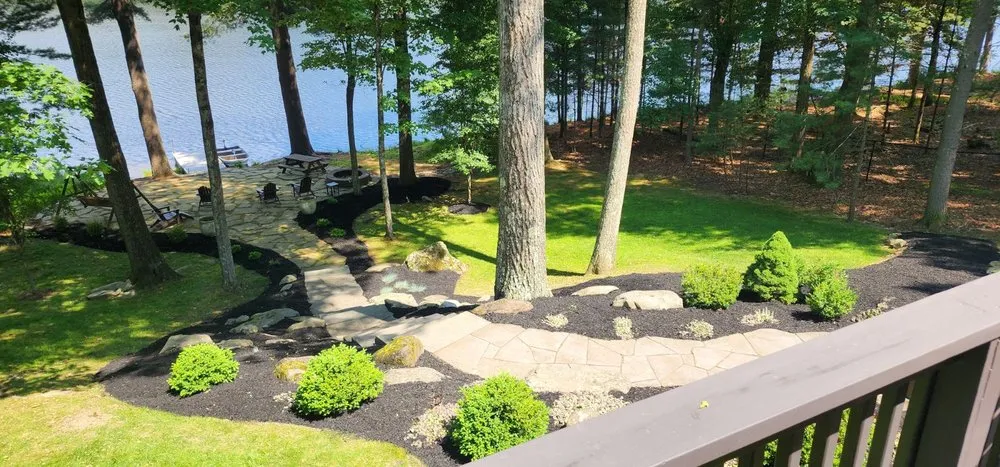 Expert outdoor landscaping with custom design in Milford, PA by Pauls LawnCare & Excavation