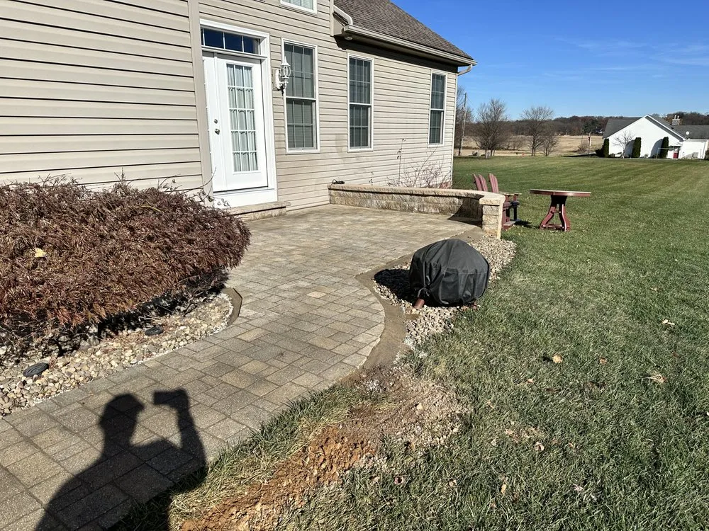 Affordable lawn care service for homes across Carlisle, PA - Paver & Plank