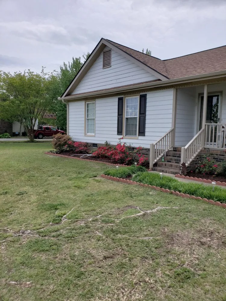 Local lawn mowing service for year-round maintenance in Youngsville, NC by Paw Paws Landscaping and Lawn Services