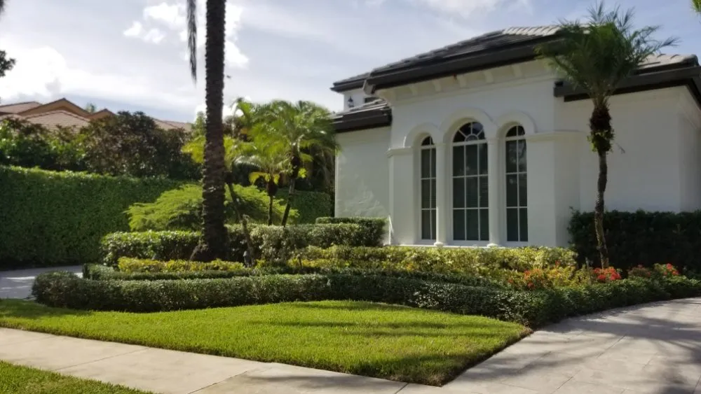 Local residential landscaping with custom design in Coral Springs, FL by Paxtor Landscaping & Lawn Maintenance