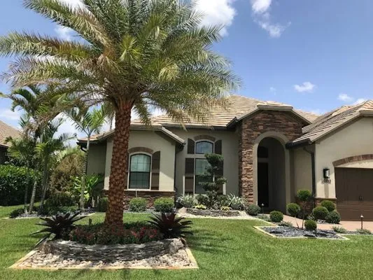 Paxtor Landscaping & Lawn Maintenance Logo