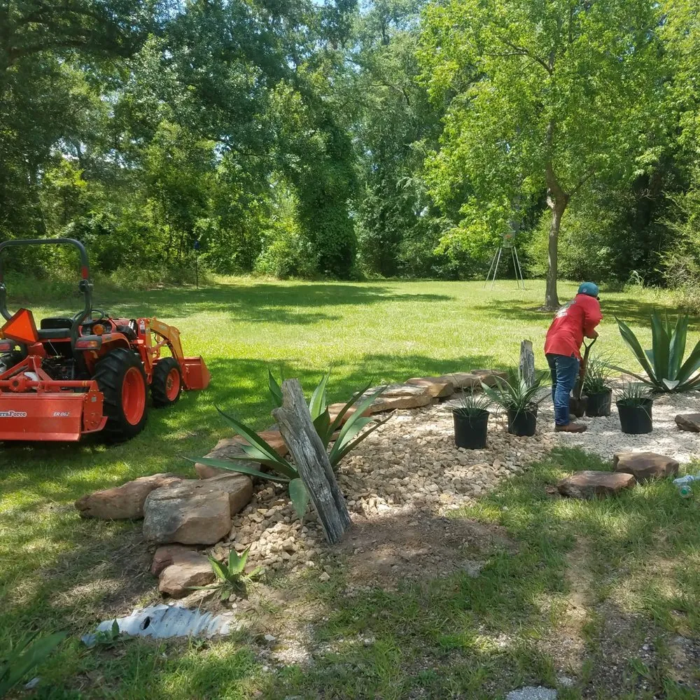 Custom outdoor landscaping in Madisonville, TX by Payan Lawn Services