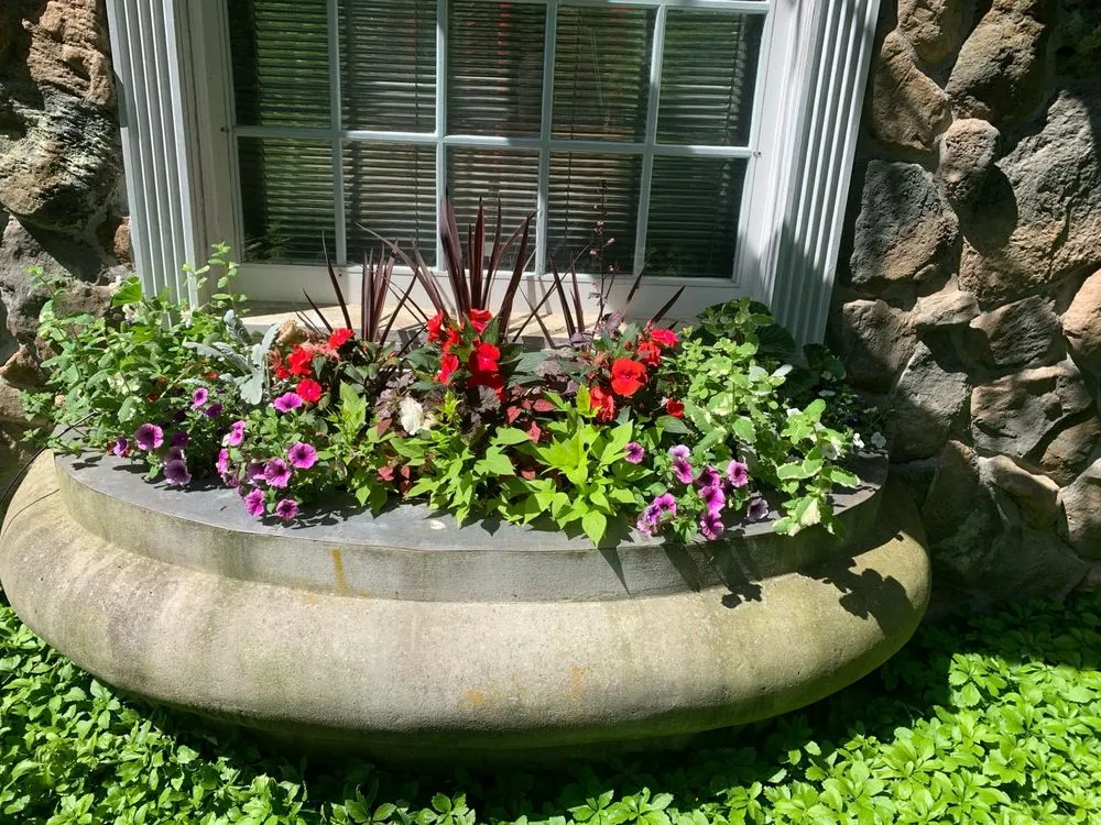 Expert yard maintenance with custom design in Stamford, CT by Payes Landscaping And Service