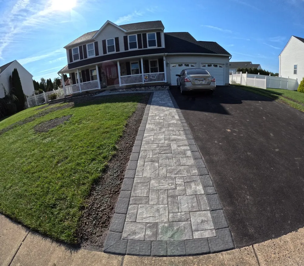 Expert yard cleanup service for homes in Langhorne, PA by Paz Landscaping & Service