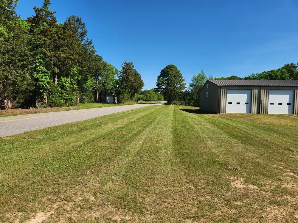 Affordable yard cleanup service for homes across Clarksville, AR - P&C Lawn Care