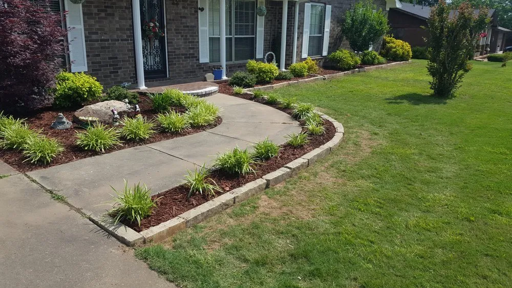 Professional residential landscaping for residential properties across Clarksville, AR - P&C Lawn Care