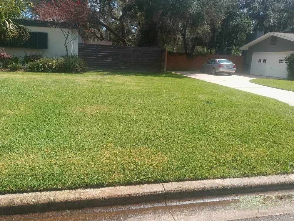 Professional lawn mowing service for outdoor upgrades in Bronson, FL by P&C Ultimate Lawn Care