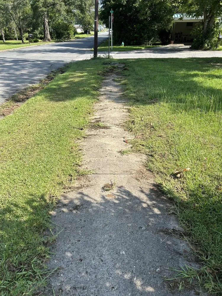 Custom lawn care service for homes in Cottondale, FL by Peacock’s Lawn & Maintenance