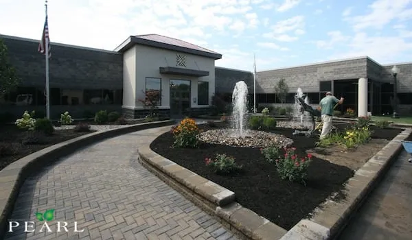 Custom lawn mowing service for homes in Clifton Park, NY by Pearl Landscaping & Patio Company