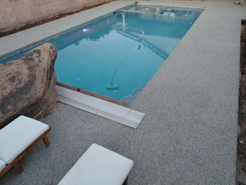 Professional yard cleanup service for year-round maintenance across St. George, UT - Pebble Stone Oasis